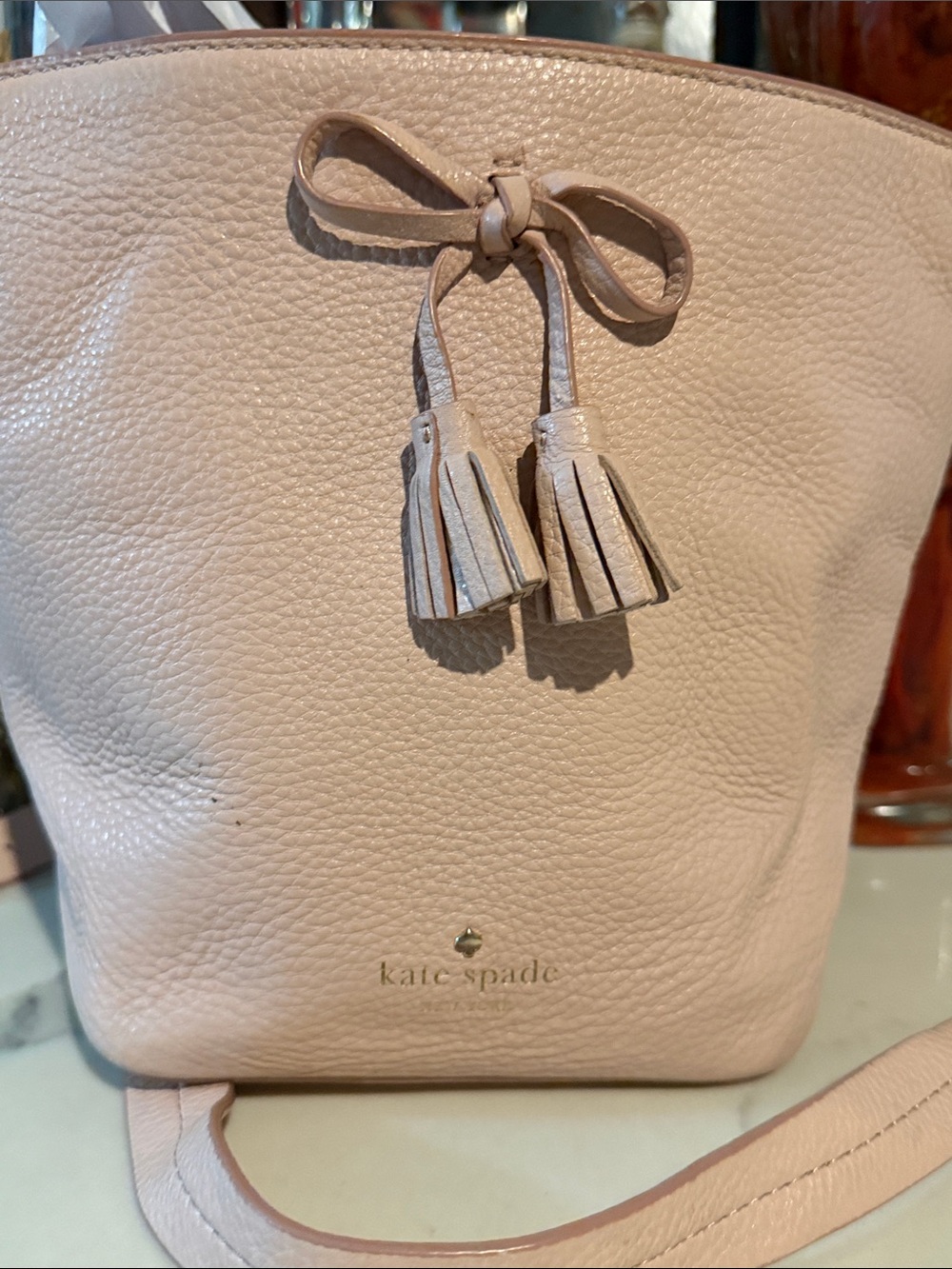 kate spade Pebbled Leather Tassel Crossbody Bag in Pale Pink
